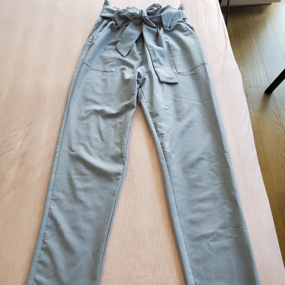 Slim trousers with bow tie